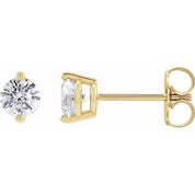 14K Yellow 1/8 CTW Natural Diamond 2-Prong Stud Earrings