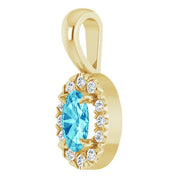 14K Yellow 5x3 mm Natural Blue Zircon & .05 CTW Natural Diamond Halo-Style Pendant