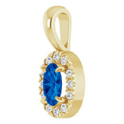 14K Yellow 5x3 mm Natural Blue Sapphire & .05 CTW Natural Diamond Halo-Style Pendant