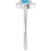 Sterling Silver Natural Blue Zircon & 1/10 CTW Natural Diamond French-Set Halo-Style Ring