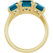 14K Yellow 8x6 mm Emerald Natural London Blue Topaz Three-Stone Ring