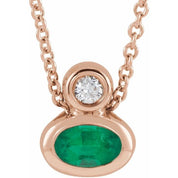 14K 5x3 mm Oval Natural Emerald & .03 CT Natural Diamond 16-18" Necklace