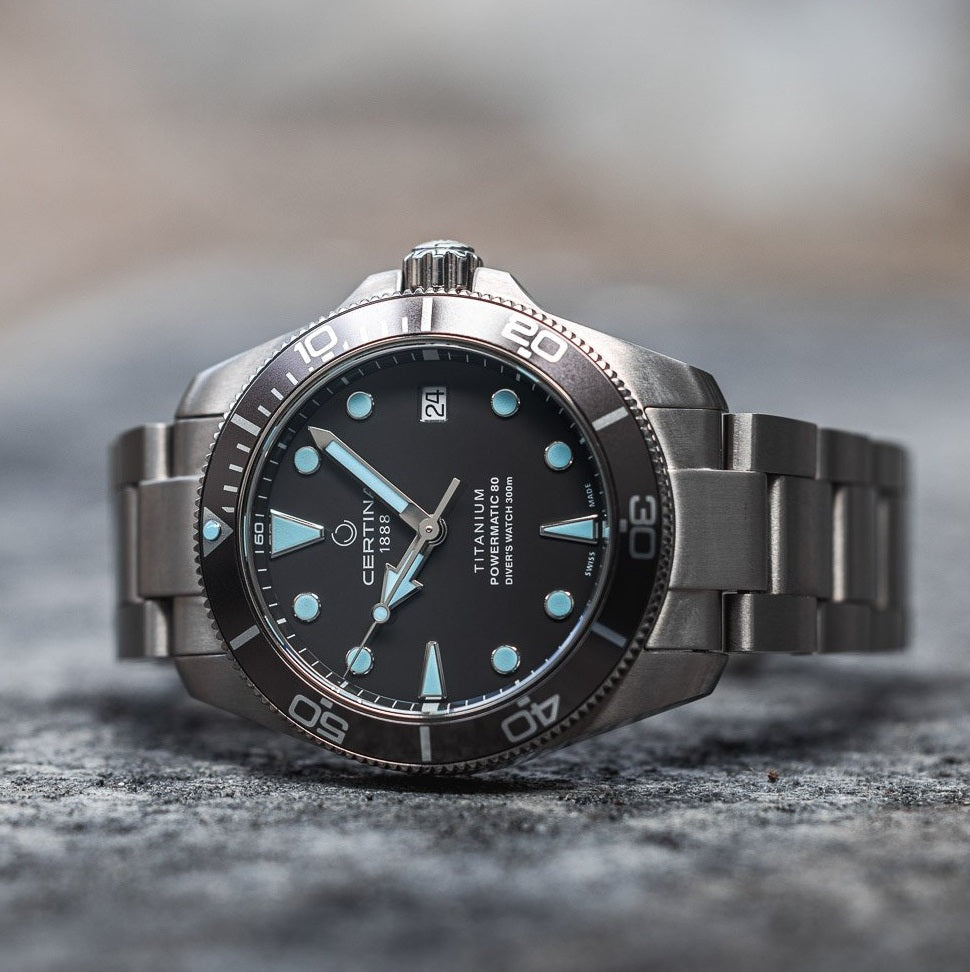 High-end mechanical luxury watch resting crown-up to regulate positional deviation overnight.