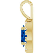 14K Yellow 6x4 mm Lab-Grown Blue Sapphire & 1/10 CTW Natural Diamond Halo-Style Pendant