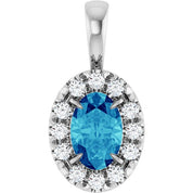 14K White 6x4 mm Natural Blue Zircon & 1/10 CTW Natural Diamond Halo-Style Pendant