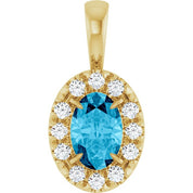 14K Yellow 6x4 mm Natural Aquamarine & 1/10 CTW Natural Diamond Halo-Style Pendant