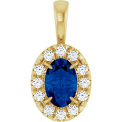 14K Yellow 6x4 mm Natural Blue Sapphire & 1/10 CTW Natural Diamond Halo-Style Pendant