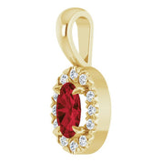 14K Yellow 5x3 mm Natural Mozambique Garnet & .05 CTW Natural Diamond Halo-Style Pendant