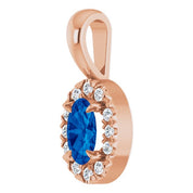 14K Rose 5x3 mm Natural Blue Sapphire & .05 CTW Natural Diamond Halo-Style Pendant