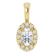 14K Yellow 5x3 mm Natural White Sapphire & .05 CTW Natural Diamond Halo-Style Pendant