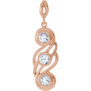 14K Rose 3/8 CTW Natural Diamond Bezel-Set Three-Stone Pendant